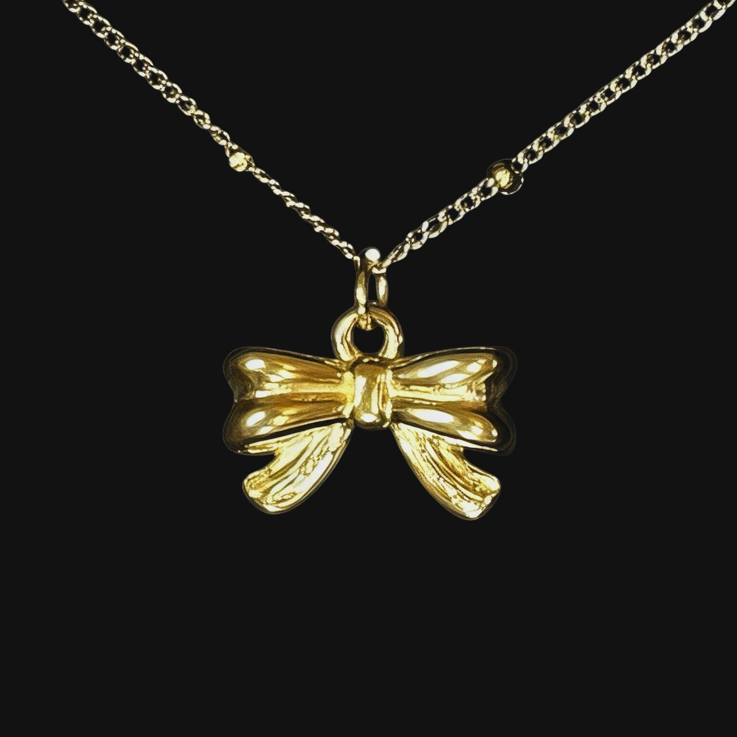 Bow necklace guld