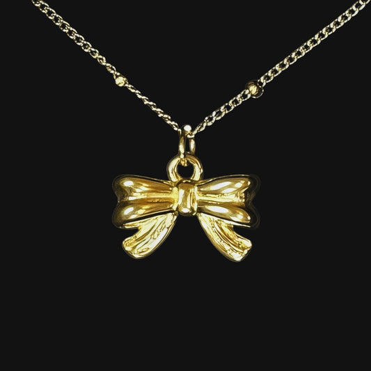 Bow necklace guld